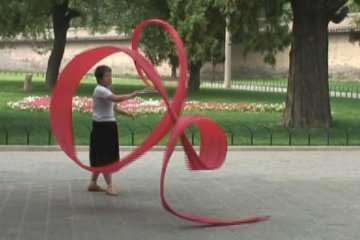 If happiness is doing your own thing, the arcade leading to the Temple of Heaven is full of happy people!*