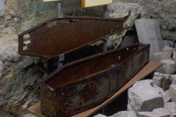 A rusty iron coffin, the ultimate in post morten security*