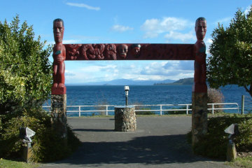 Beautiful Lake Taupo with snow-covered volcanoes in the distance*